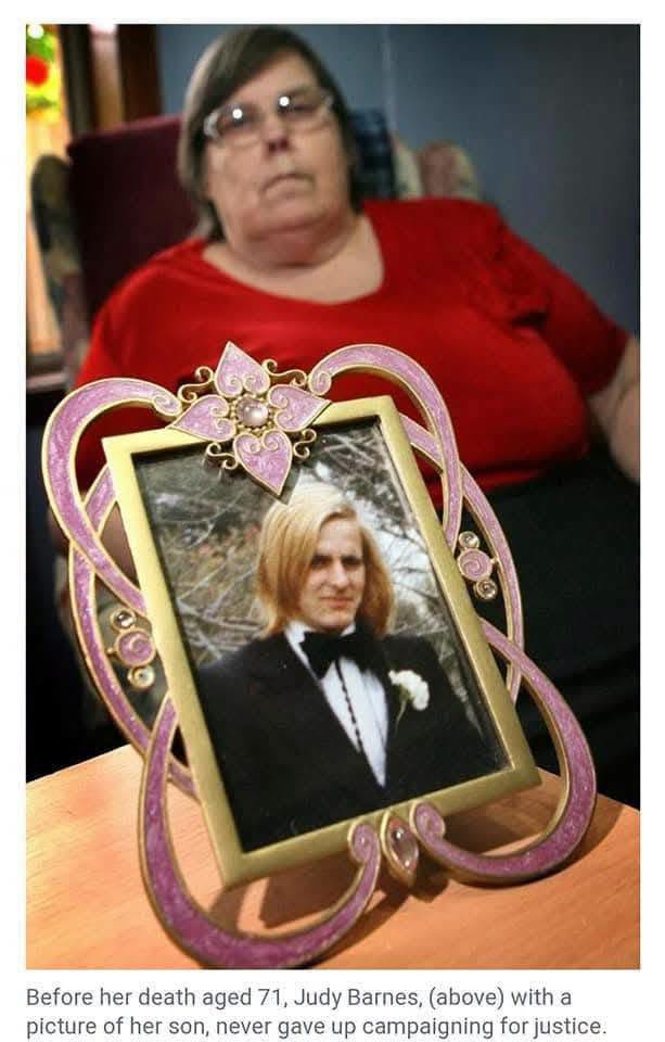 Judy Barnes with a framed photograph of her son Alan